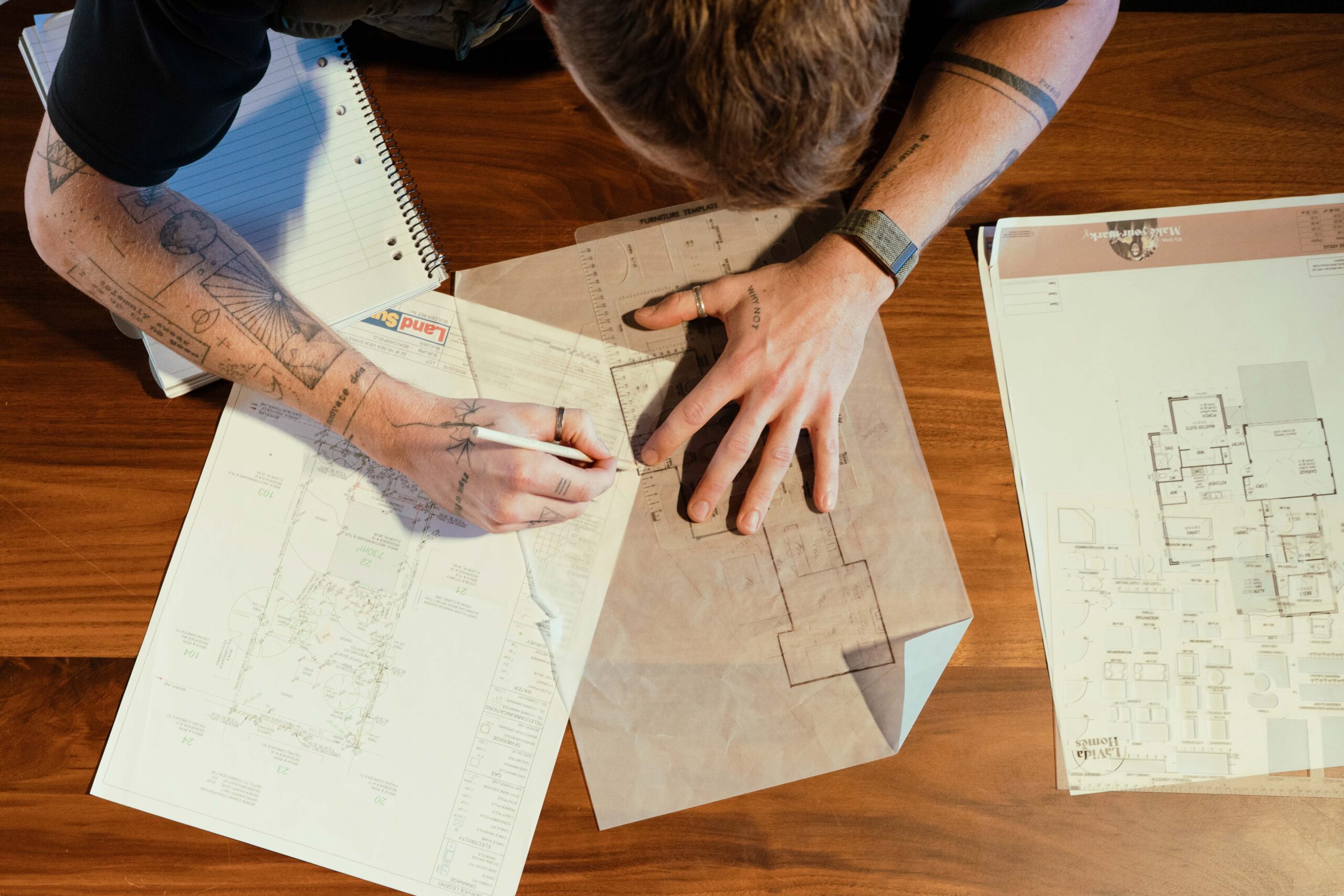 The House and Land Co team reviews a home plan